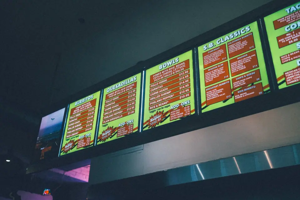 A tilted menu forms a band of bright color above deep shadow.